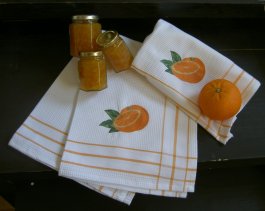 vit kökshandduk med apelsiner som applikation våfflad kökshandduk svensk design